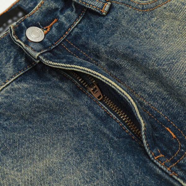 Color blocked yellow mud dyed washed denim jeans