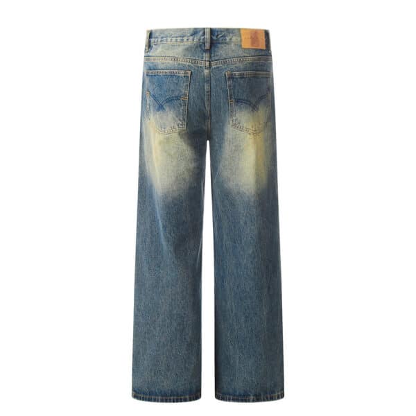 Color blocked yellow mud dyed washed denim jeans